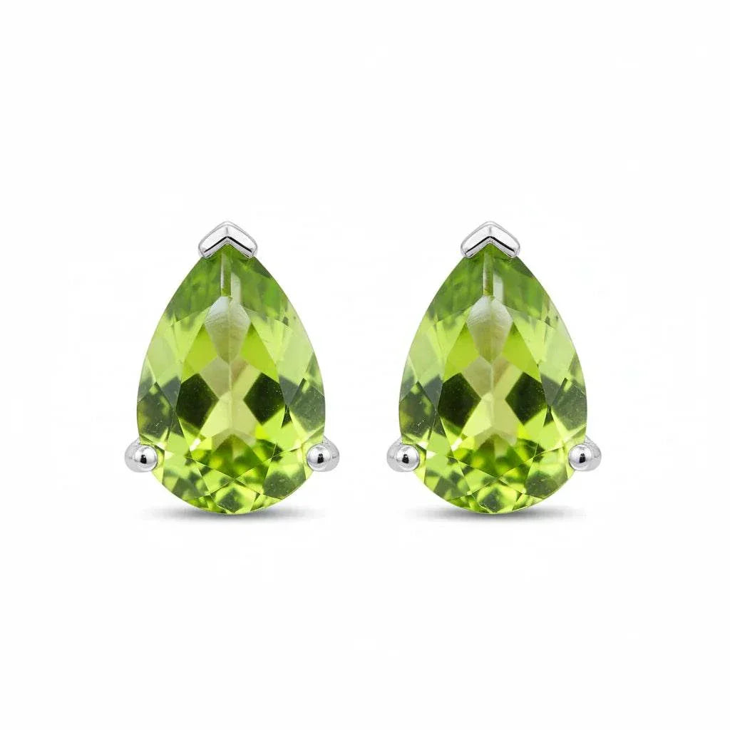 Natural peridot pear earrings set in 14K white gold with faceted gemstones and butterfly backings