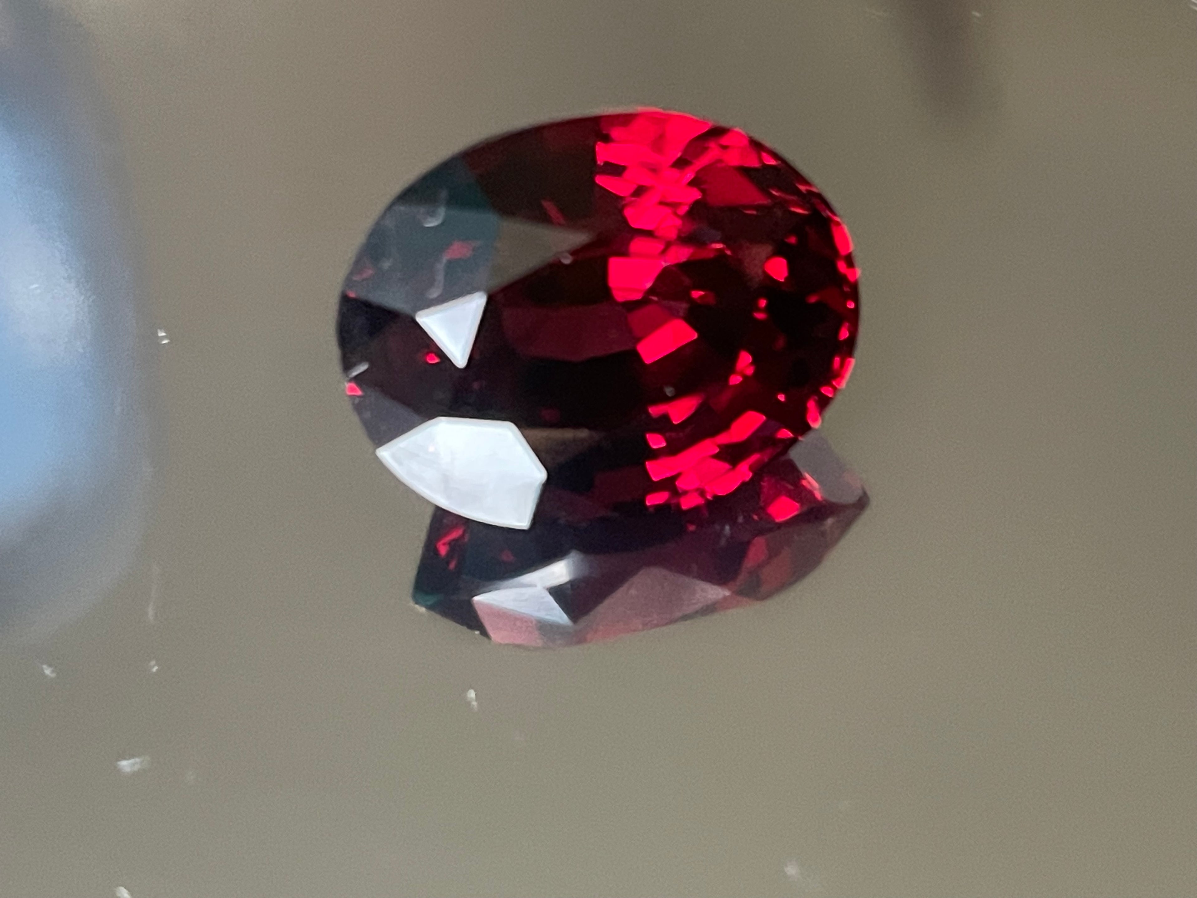 Certified 14.06 Ct Vivid Red Garnet with Pink Hue – Untreated, VS Clarity, Fancy Oval Cut – Ideal for High-End Jewelry or Collectors