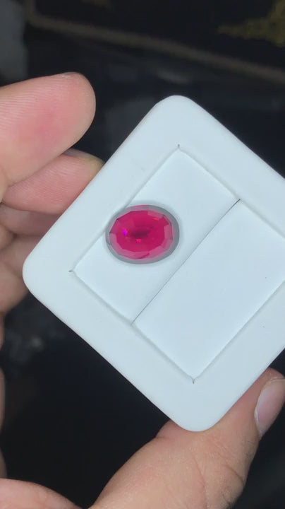 Certified 14.06 Ct Vivid Red Garnet with Pink Hue – Untreated, VS Clarity, Fancy Oval Cut – Ideal for High-End Jewelry or Collectors